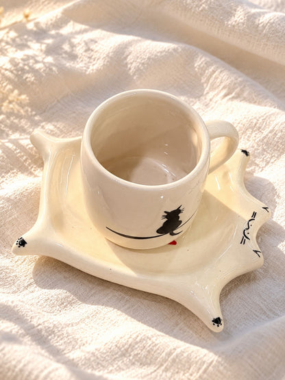 Cat cup and saucer set with black cat cup on cat-shaped ceramic saucer