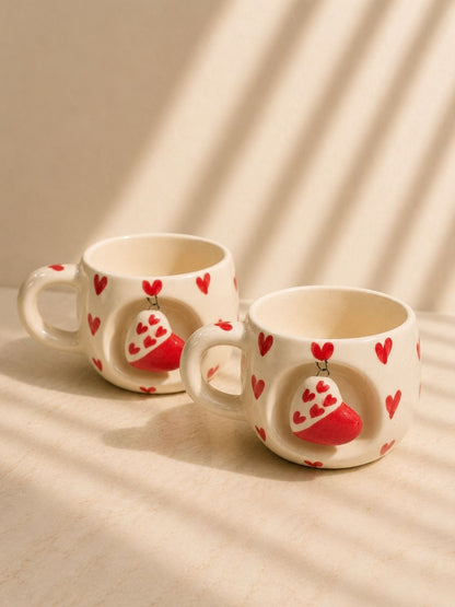 Hand-painted ceramic coffee mug with yellow citrus motif and circular handle by Chaak Design.
