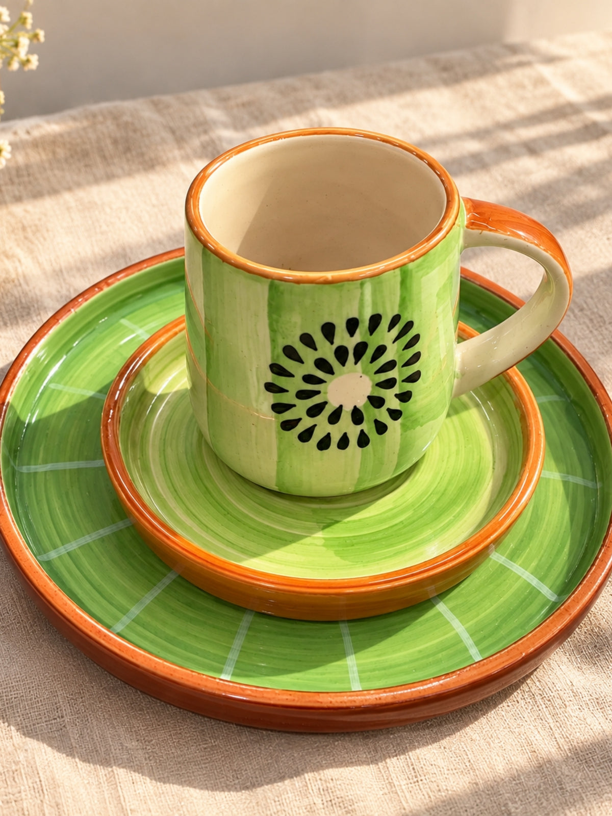 Hand-painted kiwi design ceramic tableware by Chaak Design