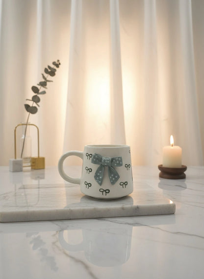 Handcrafted Ceramic Mug with Bow Design | Luxury Artisan Tableware